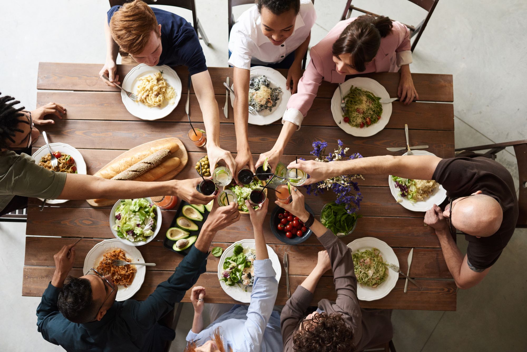 Adults sharing a meal and conversation